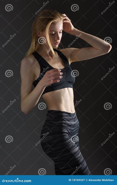 Beautiful Blonde Woman Perfect Athletic Slim Figure Engaged In Yoga Exercise Or Fitness Lead