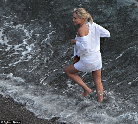 How Old Is She Again Sharon Stone Flaunts Her Curves In White Bikini Photos Ynaija