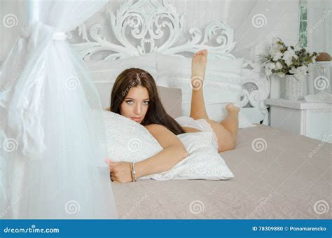 Brunette Girl In Lingerie Lying In The Bed Stock Photo Image Of Sensual Lady