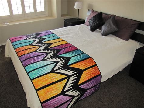 Canton Village Quilt Works | Quilts on the Bed