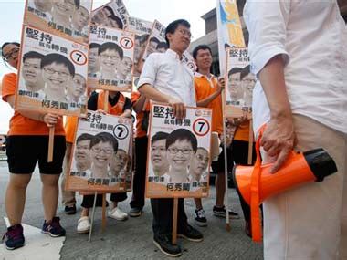 Hong Kong votes in key legislative elections – Firstpost