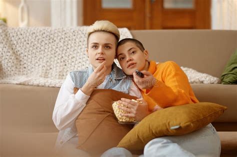 Cheerful Loving Lesbian Woman Couple Eating Popcorn Watching Movie On Tv Stock Image Image Of