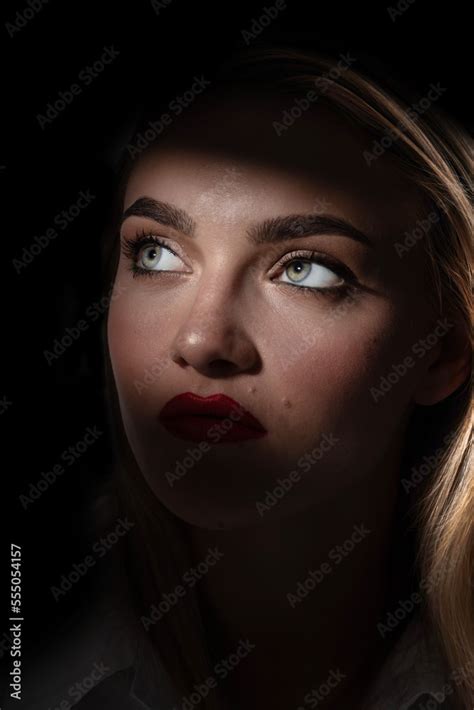 Fashion And Make Up Concept Beautiful Blonde Woman Portrait Partly Face Covered With Shadow