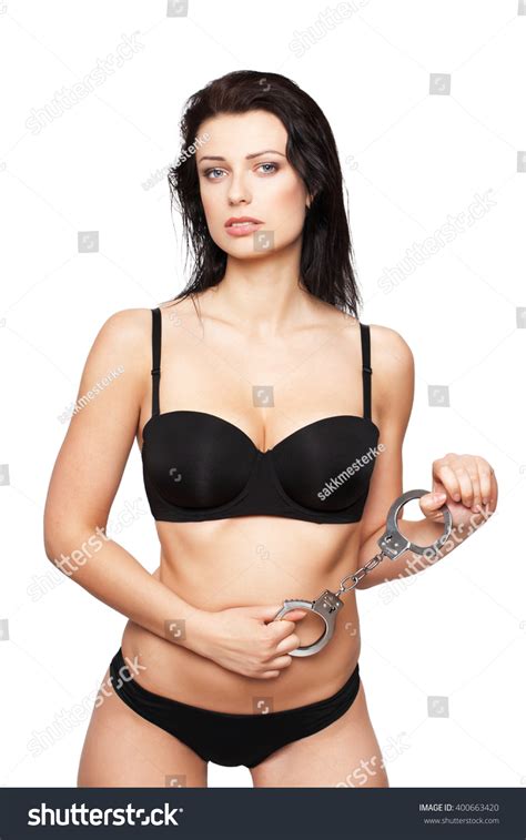 Sexy Brunette Woman Holding Handcuffs Isolated Stock Photo 400663420 Shutterstock