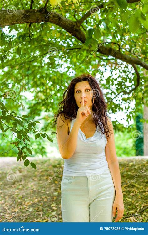 Curvy Buxom Mature Woman Asks For Silence Stock Photo Image Of Hushing Mature 75072926