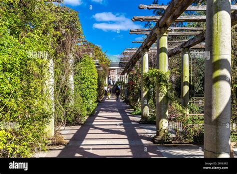 People Taking Walks At The Hampstead Heath Pergola And Hill Gardens