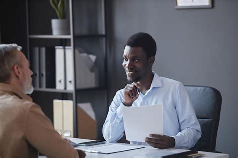 Premium Photo Black Man Listening To Senior Candidate At Job Interview