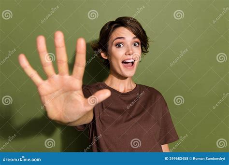 Photo Of Impressed Funky Positive Girl With Bob Hairdo Dressed Brown T