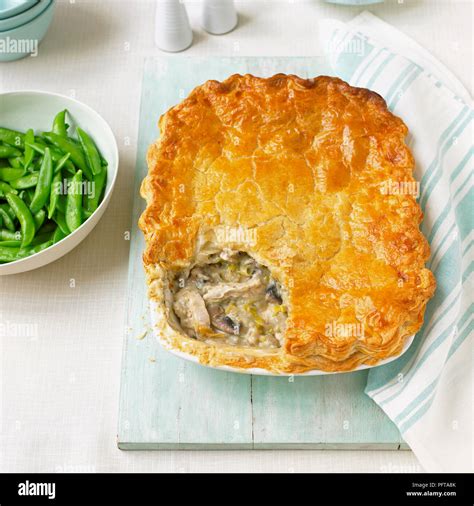 Chicken, leek and mushroom pie Stock Photo - Alamy