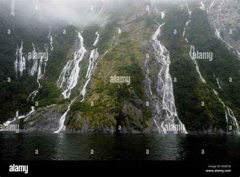 Hundreds of waterfalls flowing from the mountains during the rainstorm ...