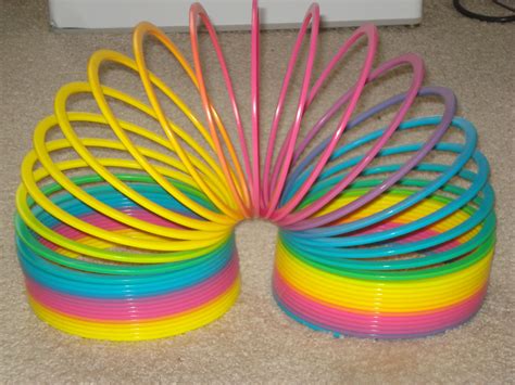 Giant rainbow slinky!! | Childhood games, All things cute, 90s kids