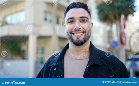 Young Arab Man Smiling Confident Standing At Street Stock Photo Image