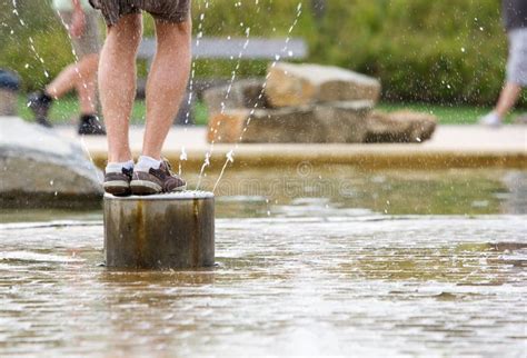 Splashing in the water stock photo. Image of small, cute - 10490414