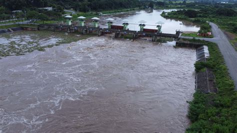 Aerial view of the water released from the concrete dam's drainage