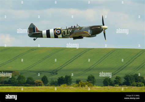 Duxford England A Supermarine Spitfire With The D Day Livery Takes To