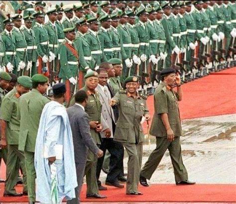 Babangida And Aikhomu Decorating Abacha With His New Rank Throwback