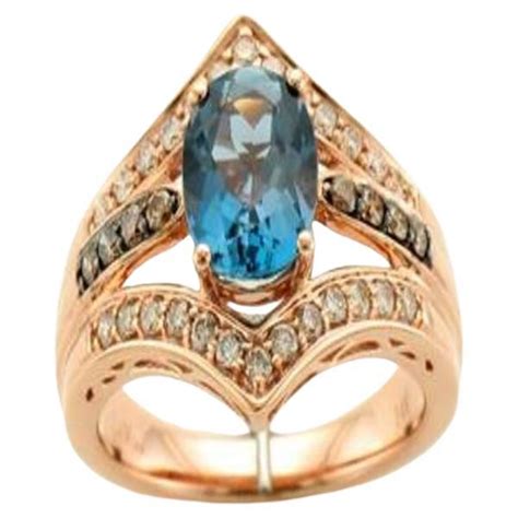 Le Vian Ring Featuring Deep Sea Blue Topaz Chocolate Diamonds Nude