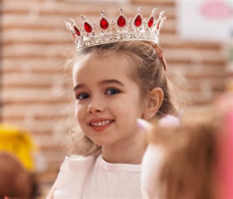 Adorable Caucasian Girl Smiling Confident Wearing Queen Crown At