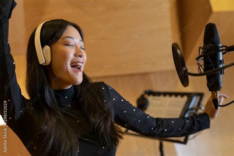 Singer in Recording Studio Stock Photo | Adobe Stock