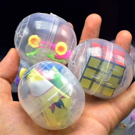Multi Styles Twisted Egg Toys 47x55mm Transparent Plastic Cheap Toys