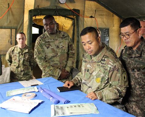 Command Sgt Maj Walter Atagalicud Inspects 502nd Field Hospital