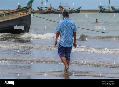 Man Relaxing On The Beautiful Beach At Cox S Bazar In Bangladesh