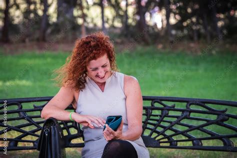 Mature Year Old Woman With Curly Red Hair And White Skin With