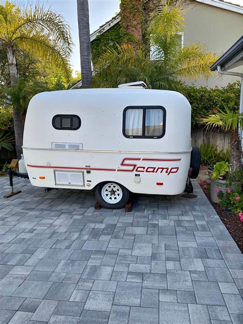 A hidden storage hack for a Scamp travel trailer was discovered 8