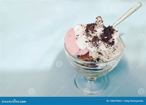 Various Colorful Ice Cream With A Spoon In Glass Bowl On Table Retro