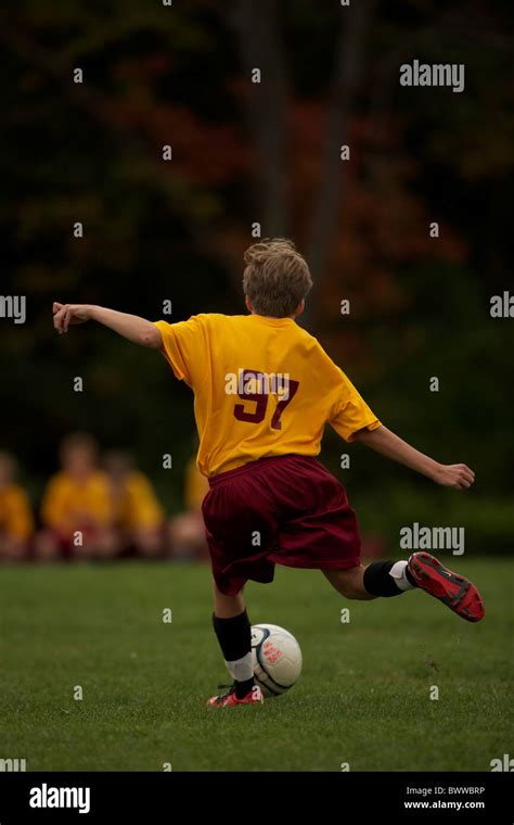 Boy playing soccer (football) - New York - USA - 13 years old Stock ...