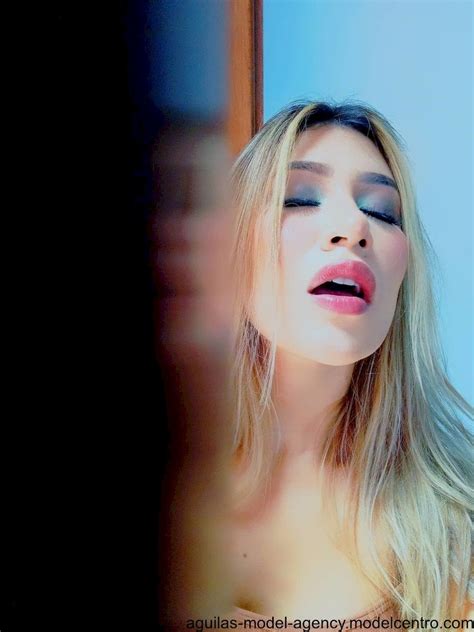 Stunning Blonde Chick Teasing With Her Big Cleavage Outdoors Photos