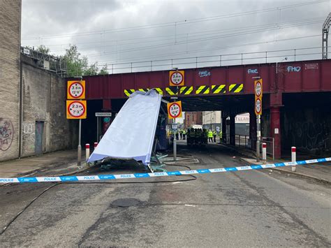 Ten People In Hospital After Roof Ripped Off Bus In Rail Bridge Crash