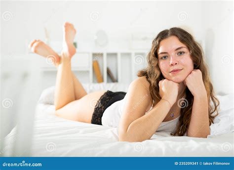 Woman With Long Hair In Underwear Lying On Bed Stock Image Image Of Naked Brunette