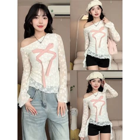 ÁO REN HOA ĐÍNH NƠ LỆCH VAI TAY LOE TUA RUA HOT LYMZSTORE Shopee Việt Nam