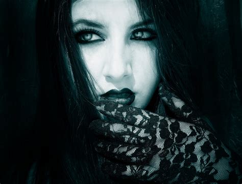 Gothic Elegance: HD Wallpaper of a Woman in Lace Gloves