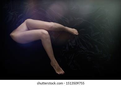 Nude Woman Legs On Black Background Stock Photo Shutterstock