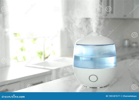 Air Humidifier On Table In Kitchen Space For Text Stock Image Image