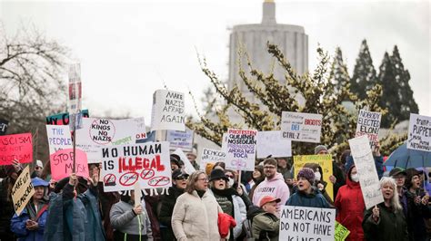 Hundreds protest Trump at Oregon State Capitol on Presidents Day