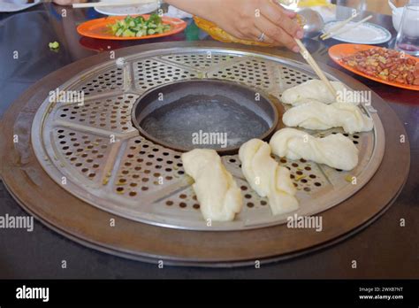 It S A Traditional Chinese Stove Hot Pot That Is Commonly Used In The Northeast The Steam From