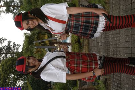 Two Hot Girls Showing Their Nice Figures In Uniforms Photos