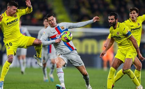barcelona edge  villarreal    points clear  la liga world