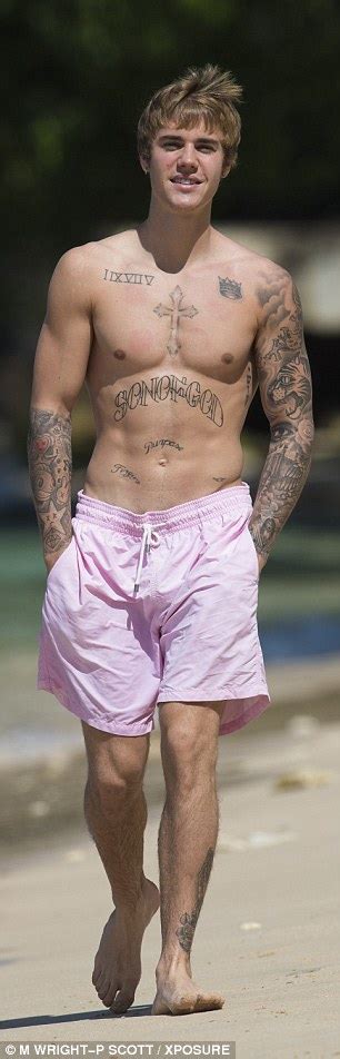 Justin Bieber Attracts Bikini Clad Fans While Hitting The Beach On His