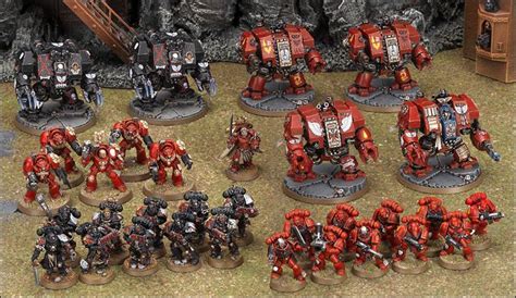 A Bunch Of Red And Black Warhammers Are Standing In Front Of Each Other