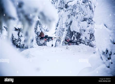 Participants Of The Swedish Basic Winter Warfare Course Shoot Their