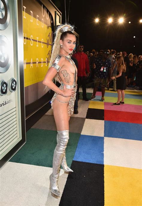 Almost Naked Miley Cyrus Shuts Down MTV VMAs Red Carpet In Boob Baring Metallic Suspenders