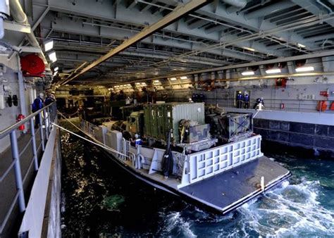 A Landing Craft Utility Lcu Assigned To Assault Craft Unit Two Acu 2 Prepares To Depart The