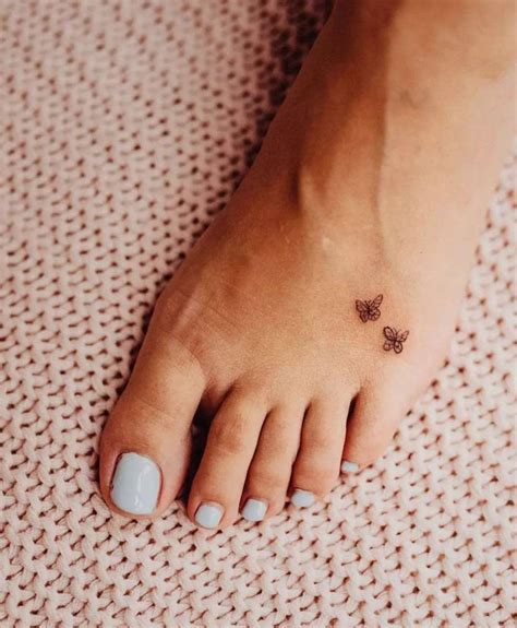 Fine Line Micro Butterflies Tattoo On The Foot