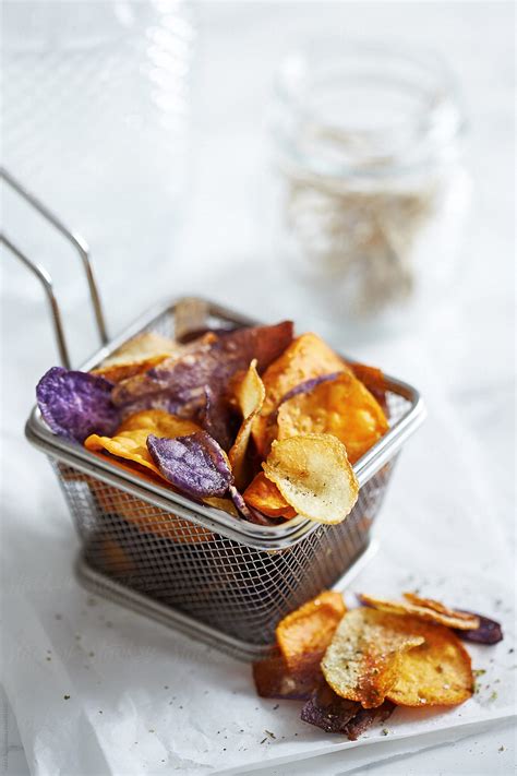 "Sweet And Purple Potato Chips" by Stocksy Contributor "Martí Sans ...