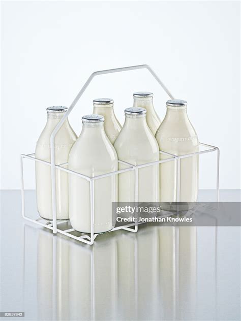 Milk Holder With Milk Bottles High-Res Stock Photo - Getty Images