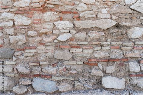 Fondo con textura de muro antiguo de piedra y ladrillo 스톡 사진 Adobe Stock